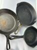 Three Cast Iron Fry Pans - Lodge, Wagner & Erie