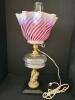 Lovely Cherub Table Lamp With Pink White Ruffled Swirl Shade