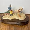 "Cutting the Family Christmas Tree" Schmid BFA Figurine by Lowell Davis