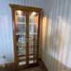 Lighted Glass Curio Cabinet With Brass Pulls