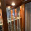 Lighted Glass Curio Cabinet With Brass Pulls - 7