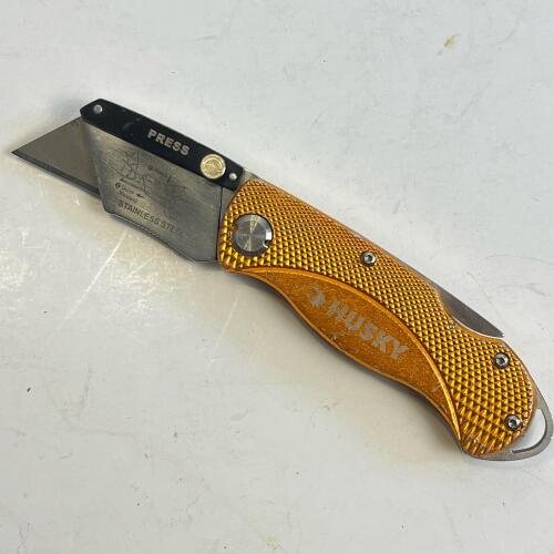 Husky Folding Utility Knife with Orange Textured Handle