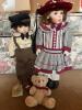 Pair of Franklin Heirloom Porcelain Dolls and Small Articulated Stuffed Bear
