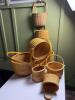 Eight Woven Rattan and Wood Handle Baskets