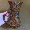 Trio of Brown Embossed Ceramic Pitchers With Grapevine Motif - 3