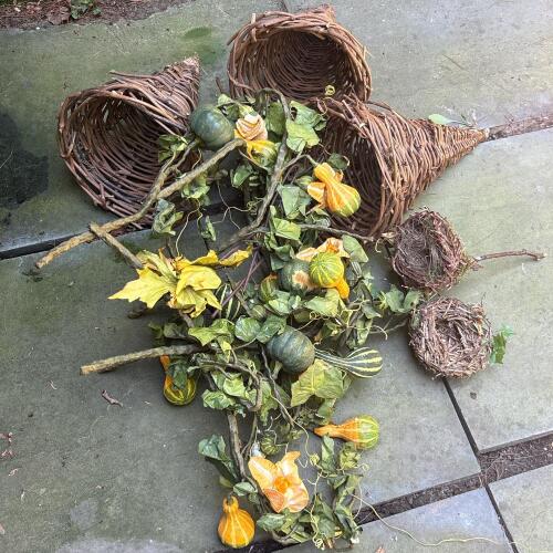 Three Wicker Wall Baskets With Faux Gourd and Leaf Arrangements