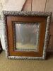 Ornate Victorian-Style Wood and Pressed Metal Framed Mirror