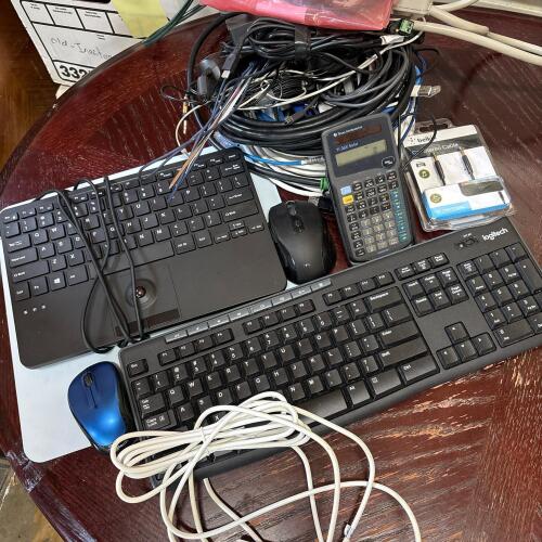 Mixed Computer Keyboards, Mice, Calculator, and Cables