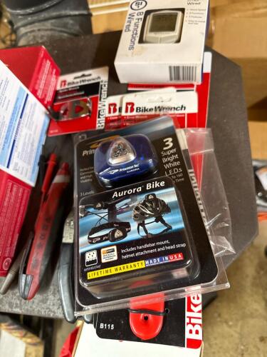 Assorted Bike Wrench Bicycle Tools and Princeton Tec Aurora Bike Light, with Other Items