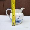 Blue and White Ceramic Pitcher With Gilt Rim, Windmill Motif - 2