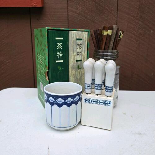 Assorted Asian Tableware: Chopsticks, Butter Knives, and Cup
