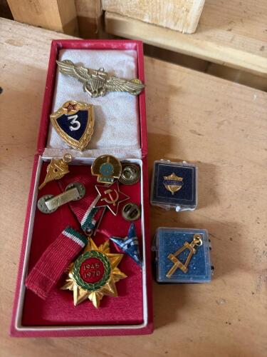 Assorted Soviet and Military-Style Badges, Pins, and Medals