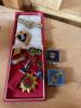 Assorted Soviet and Military-Style Badges, Pins, and Medals