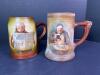 Pair of Vintage Pottery Handled Character Beer Steins