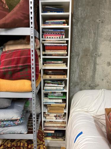 Cookbook Collection With Tall White Bookshelf