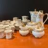 Assorted Limoges and Nippon Porcelain Hot Chocolate Pitchers and Cups
