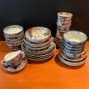 Assorted Japanese and Chinese-Style Porcelain Bowls, Plates, and Cups