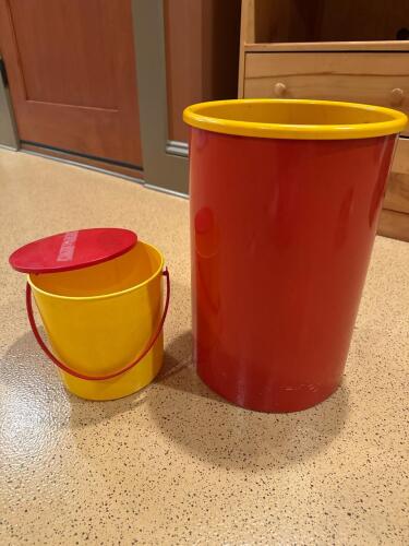 Red and Yellow Plastic Canisters
