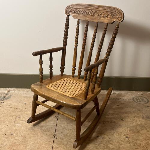 Child's Spindle-Back Wooden Rocking Chair With Cane Seat