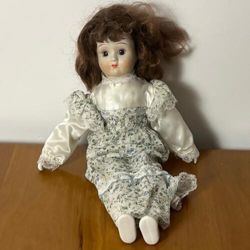 Vintage Porcelain Doll in Floral Dress