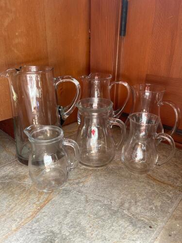Clear Glass Pitchers with Pair of Italian "Cerve" Pitchers