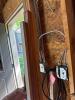 Mixed Utility Handles, Stakes, and Scrap Wood Bundle with Gas Cans and Storage - 6