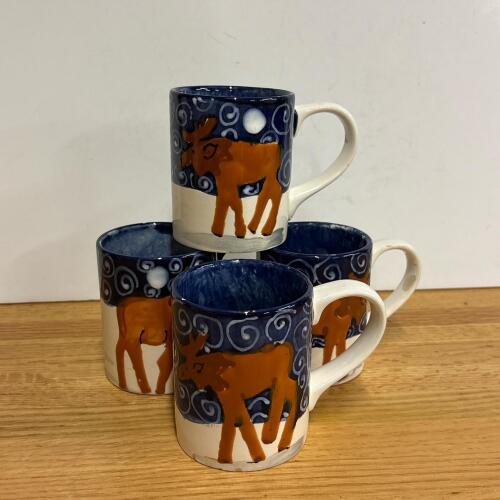 Four Signed Ceramic Moose Mugs