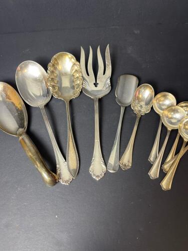 Assorted Silver-Plated Serving Utensils and Spoons