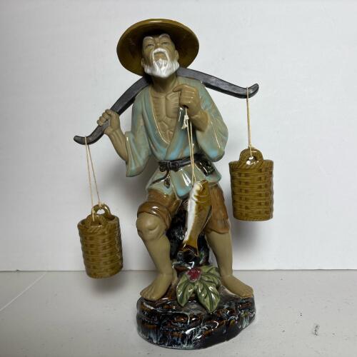 Ceramic Figurine of Fisherman Carrying Baskets