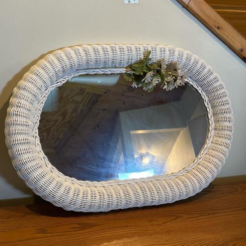 White Wicker-Style Oval Mirror With Faux Floral Accent