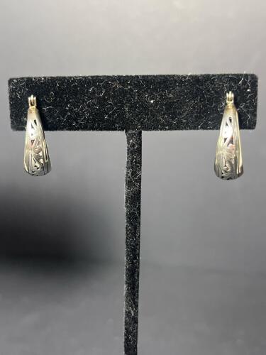 Pair of Sterling Silver Hoop Earrings With Cut-Out Design