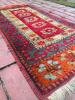 Handwoven Wool Rug With Geometric Floral Motif - 2