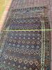 Handwoven Wool Rug in Tribal-Style Geometric Pattern - 11