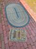 Braided Oval Rug and Small Worn Geometric-Patterned Rug