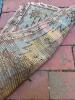 Braided Oval Rug and Small Worn Geometric-Patterned Rug - 3