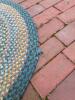 Braided Oval Rug and Small Worn Geometric-Patterned Rug - 7