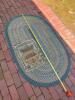 Braided Oval Rug and Small Worn Geometric-Patterned Rug - 8