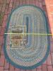 Braided Oval Rug and Small Worn Geometric-Patterned Rug - 9
