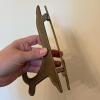 Wine Bottle Cradle and Two Brass-Tone Display Easels - 6