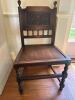Jacobean Style Carved Wood Chair with Burgundy Vinyl Cushion