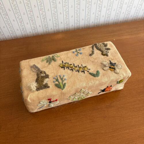 Embroidered Linen Covered Brick with Animal and Floral Motifs