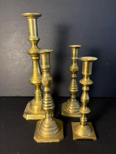 Four Brass Candlesticks Set in Colonial-Style