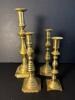 Four Brass Candlesticks Set in Colonial-Style