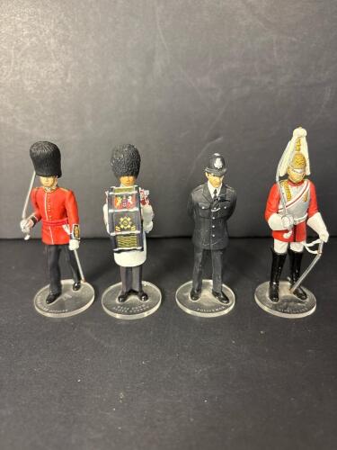 Four Corgi Icon British Guardsmen and Policeman Figurines
