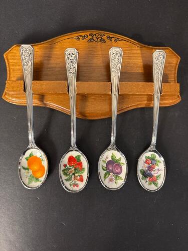 Four Avon Fruit Motif Collector Spoons with Wooden Display Rack