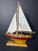 Small Wooden Sailboat Model with Quote on Sail