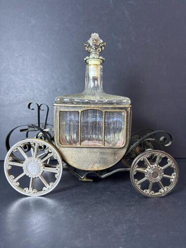 Carriage-Shaped Glass Decanter Bottle with Ornate Metal Wheels