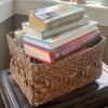 Assorted Travel Guides and Novels in Woven Basket