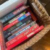 Assorted Travel Guides and Novels in Woven Basket - 4