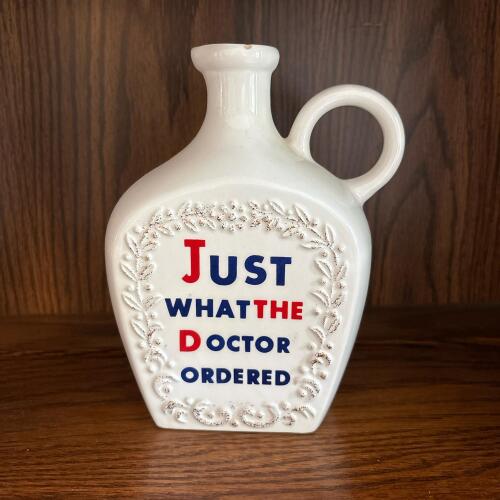 White Ceramic Flask With "Just What the Doctor Ordered" Design